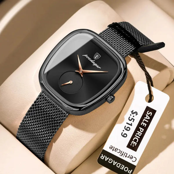 Black watch with a tag displaying a sale price on a beige surface