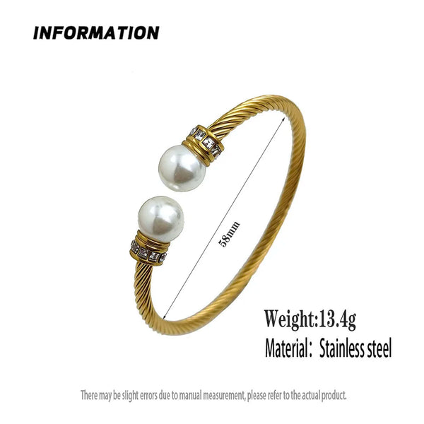 Gold bracelet with pearls and diamonds on a white background