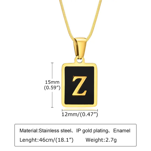 Gold necklace with a black square pendant featuring the letter 'Z', showing measurements and material details.