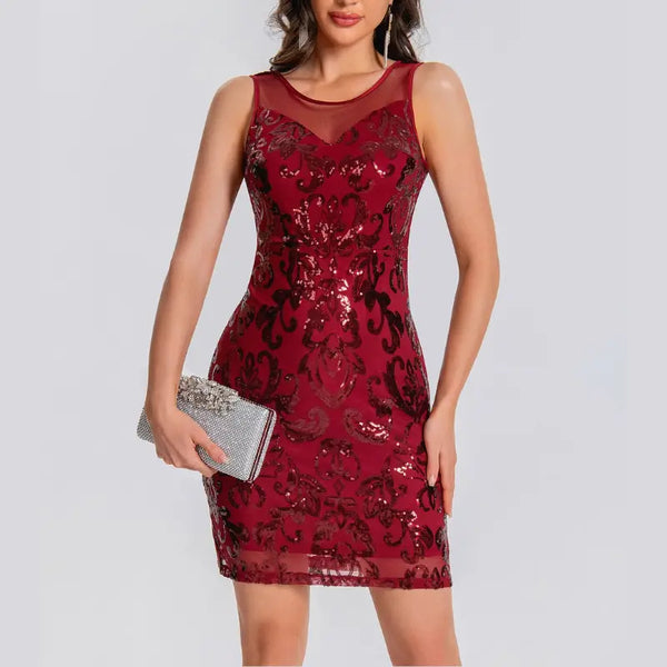 Red lace dress worn by a model on a white background