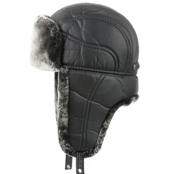 Black winter hat with fur trim on a white background