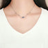 products/model-wearing-necklace.webp