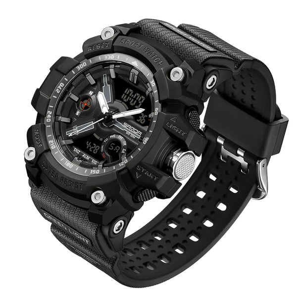 A rugged black sports watch with a textured strap, digital display, and analog hands, shown on a plain white background.