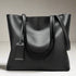 files/black-bucket-handbag.webp