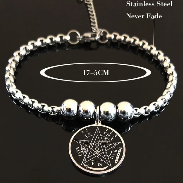 Silver bracelet with pentagram charm on a black background