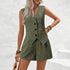 Woman wearing a green vest and shorts set against a white background