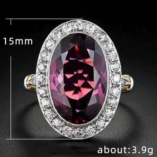 Ring with a large purple gemstone and smaller diamonds on a black background