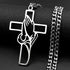 Silver cross pendant with chain on a black background