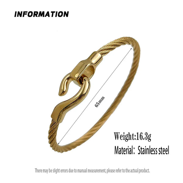 Gold bracelet with measurement details on a white background