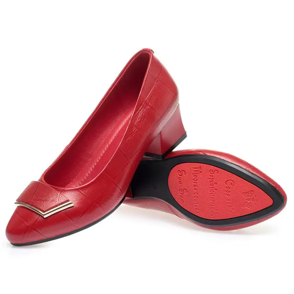 Red shoes with a gold accent on a white background