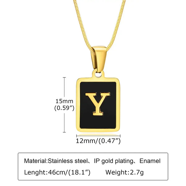 Gold necklace with a black square pendant featuring the letter 'Y', showing measurements and material details.