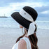 files/model-wearing-beach-hat.webp