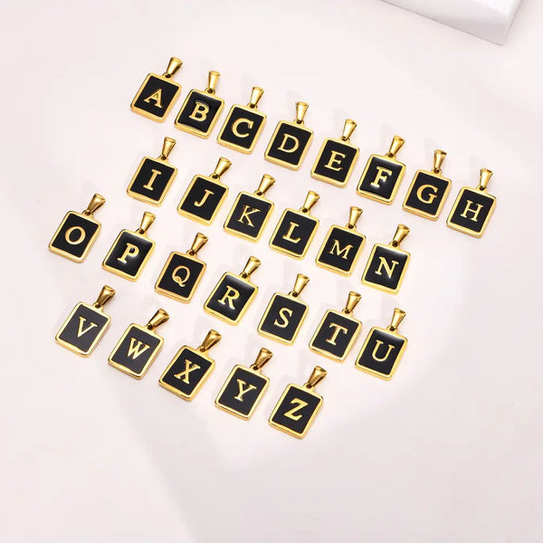 Alphabet letter pendants on a white background