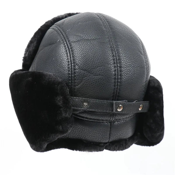 Black leather aviator hat with fur ear muffs on a white background