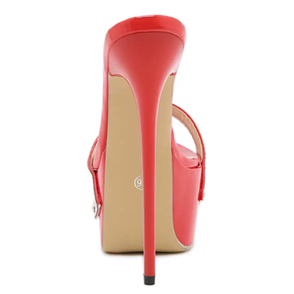 Red high-heeled shoe on a white background