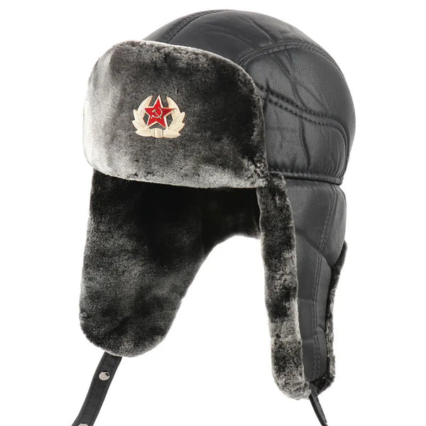 Gray winter hat with fur ear flaps and a red star emblem on a white background