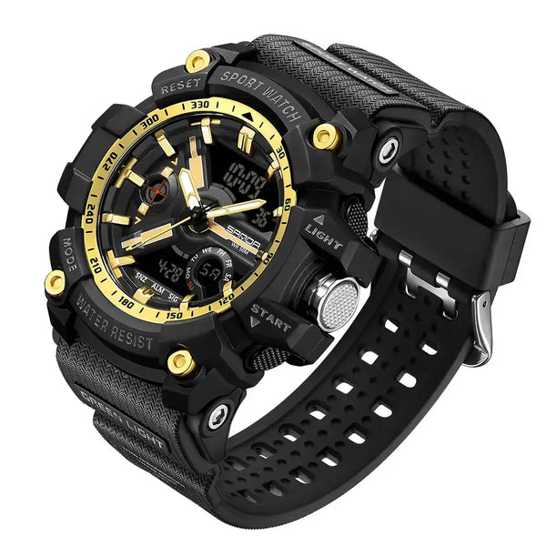 A rugged black sports watch with a textured strap, black dial, and gold-tone accents, shown on a plain white background.