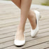 files/white-wedge-shoes.webp