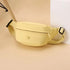 Yellow waist bag on a beige and white background