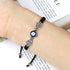 products/model-wearing-black-bracelet.webp